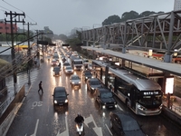 A storm hits the south zone of Sao Paulo in the region of the Joao Dias terminal in Sao Paulo, Brazil, on December 20, 2024, causing traffic...