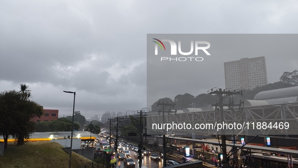 A storm hits the south zone of Sao Paulo in the region of the Joao Dias terminal in Sao Paulo, Brazil, on December 20, 2024, causing traffic...