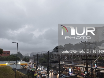 A storm hits the south zone of Sao Paulo in the region of the Joao Dias terminal in Sao Paulo, Brazil, on December 20, 2024, causing traffic...