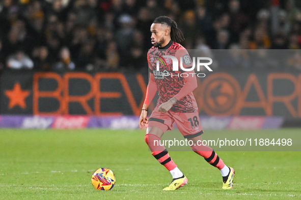 David Kasumu (18 Huddersfield) goes forward during the Sky Bet League 1 match between Cambridge United and Huddersfield Town at the Cledara...