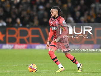 David Kasumu (18 Huddersfield) goes forward during the Sky Bet League 1 match between Cambridge United and Huddersfield Town at the Cledara...