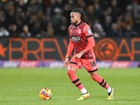 David Kasumu (18 Huddersfield) goes forward during the Sky Bet League 1 match between Cambridge United and Huddersfield Town at the Cledara...