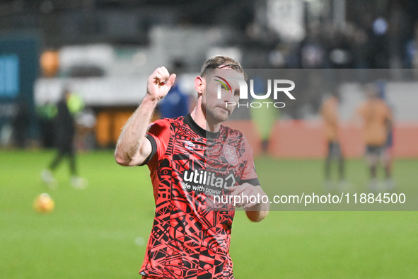 Tom Lees, 32, from Huddersfield, gestures to fans after the final whistle during the Sky Bet League 1 match between Cambridge United and Hud...