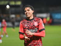 Tom Iorpenda, 28, from Huddersfield, applauds fans after the final whistle during the Sky Bet League 1 match between Cambridge United and Hu...