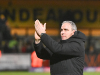 Manager Michael Duff of Huddersfield applauds fans after the final whistle during the Sky Bet League 1 match between Cambridge United and Hu...