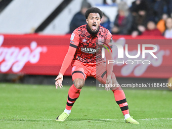 Josh Koroma (10 Huddersfield) gestures during the Sky Bet League 1 match between Cambridge United and Huddersfield Town at the Cledara Abbey...