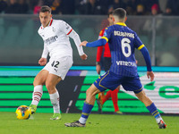 AC Milan's Filippo Terracciano plays against Hellas Verona's Reda Belahyane during the Italian Serie A Enilive soccer championship football...