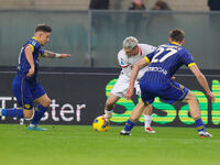 AC Milan's Alejandro Jimenez Sanchez plays against Hellas Verona's Pawel Dawidowicz during the Italian Serie A Enilive soccer championship f...