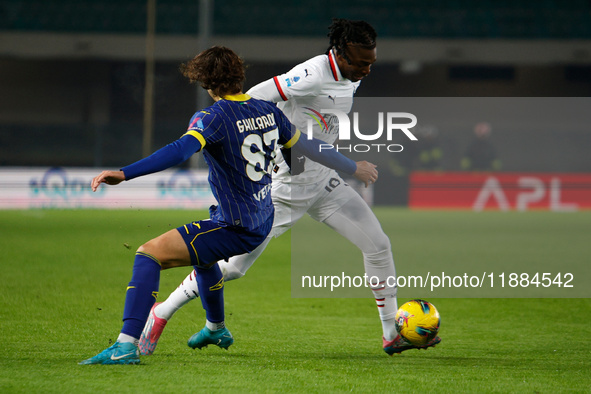 AC Milan's Rafael Leao competes against Hellas Verona's Daniele Ghilardi during the Italian Serie A Enilive soccer championship match betwee...