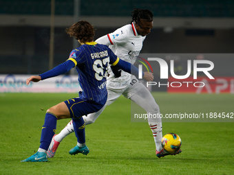 AC Milan's Rafael Leao competes against Hellas Verona's Daniele Ghilardi during the Italian Serie A Enilive soccer championship match betwee...