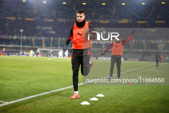 Francesco Camarda of AC Milan participates in the Italian Serie A Enilive soccer championship football match between Hellas Verona FC and AC...