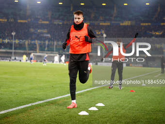 Francesco Camarda of AC Milan participates in the Italian Serie A Enilive soccer championship football match between Hellas Verona FC and AC...