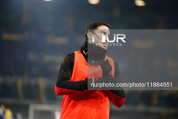 Davide Calabria of AC Milan participates in the Italian Serie A Enilive soccer championship football match between Hellas Verona FC and AC M...