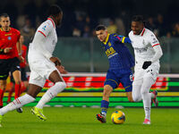 AC Milan's Rafael Leao plays against Hellas Verona's Reda Belahyane during the Italian Serie A Enilive soccer championship match between Hel...