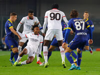 AC Milan's Samuel Chukwueze plays against Hellas Verona's Tomas Suslov during the Italian Serie A Enilive soccer championship match between...