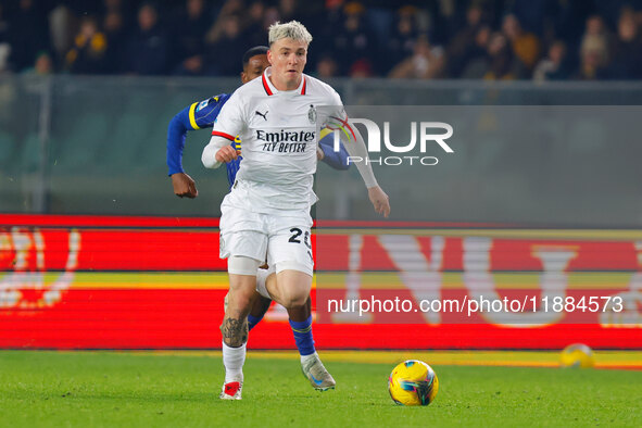 Alejandro Jimenez Sanchez of AC Milan plays against Jackson Tchatchoua of Hellas Verona during the Italian Serie A Enilive soccer championsh...