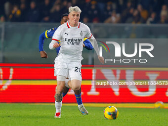 Alejandro Jimenez Sanchez of AC Milan plays against Jackson Tchatchoua of Hellas Verona during the Italian Serie A Enilive soccer championsh...