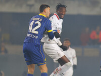 Tommy Abraham of AC Milan plays against Diego Coppola of Hellas Verona during the Italian Serie A Enilive soccer championship match between...