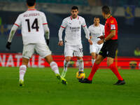 AC Milan's Theo Hernandez participates in the Italian Serie A Enilive soccer championship football match between Hellas Verona FC and AC Mil...