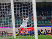 Davide Calabria of AC Milan plays against Diego Coppola of Hellas Verona during the Italian Serie A Enilive soccer championship match betwee...