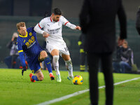 AC Milan's Theo Hernandez participates in the Italian Serie A Enilive soccer championship football match between Hellas Verona FC and AC Mil...