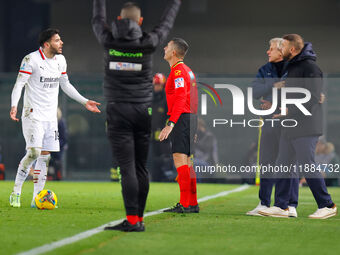 AC Milan's Theo Hernandez and Hellas Verona's head coach Paolo Zanetti participate in the Italian Serie A Enilive soccer championship footba...