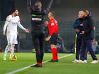 AC Milan's Theo Hernandez and Hellas Verona's head coach Paolo Zanetti participate in the Italian Serie A Enilive soccer championship footba...