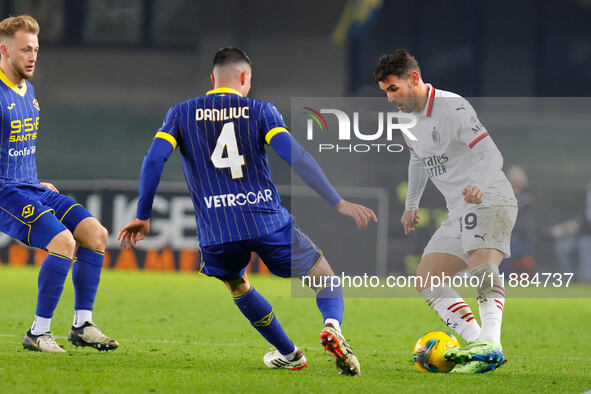 AC Milan's Theo Hernandez plays against Hellas Verona's Flavius Daniliuc during the Italian Serie A Enilive soccer championship match betwee...