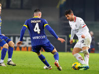 AC Milan's Theo Hernandez plays against Hellas Verona's Flavius Daniliuc during the Italian Serie A Enilive soccer championship match betwee...