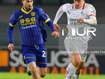 AC Milan's Filippo Terracciano plays against Hellas Verona's Suat Serdar during the Italian Serie A Enilive soccer championship football mat...