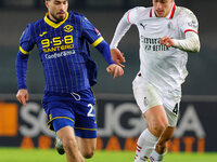 AC Milan's Filippo Terracciano plays against Hellas Verona's Suat Serdar during the Italian Serie A Enilive soccer championship football mat...