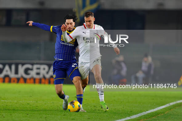 AC Milan's Filippo Terracciano plays against Hellas Verona's Suat Serdar during the Italian Serie A Enilive soccer championship football mat...