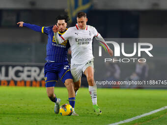 AC Milan's Filippo Terracciano plays against Hellas Verona's Suat Serdar during the Italian Serie A Enilive soccer championship football mat...