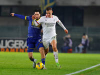 AC Milan's Filippo Terracciano plays against Hellas Verona's Suat Serdar during the Italian Serie A Enilive soccer championship football mat...