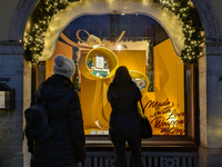 People on the street for window shopping and buying presents in Munich, Bavaria, Germany, on December 20, 2024 (