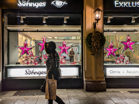 People on the street for window shopping and buying presents in Munich, Bavaria, Germany, on December 20, 2024 (