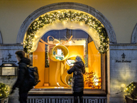 People on the street for window shopping and buying presents in Munich, Bavaria, Germany, on December 20, 2024 (