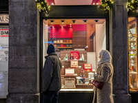 People on the street for window shopping and buying presents in Munich, Bavaria, Germany, on December 20, 2024 (