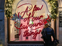 People on the street for window shopping and buying presents in Munich, Bavaria, Germany, on December 20, 2024 (