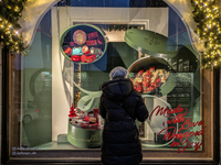 People on the street for window shopping and buying presents in Munich, Bavaria, Germany, on December 20, 2024 (