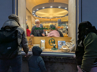 People on the street for window shopping and buying presents in Munich, Bavaria, Germany, on December 20, 2024 (