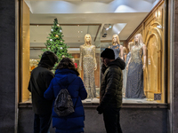 People on the street for window shopping and buying presents in Munich, Bavaria, Germany, on December 20, 2024 (