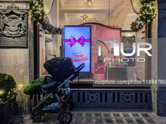 People on the street for window shopping and buying presents in Munich, Bavaria, Germany, on December 20, 2024 (