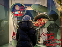 People on the street for window shopping and buying presents in Munich, Bavaria, Germany, on December 20, 2024 (