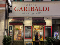 People on the street for window shopping and buying presents in Munich, Bavaria, Germany, on December 20, 2024 (