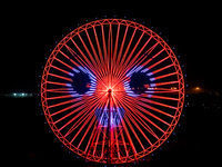 The 120-meter-high ''Chongqing Eye Ferris Wheel'' in Happy Valley opens for operation after an upgrade in Chongqing, China, on December 20,...