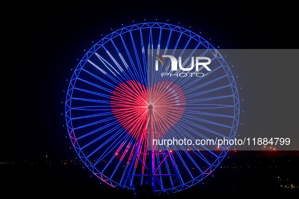 The 120-meter-high ''Chongqing Eye Ferris Wheel'' in Happy Valley opens for operation after an upgrade in Chongqing, China, on December 20,...