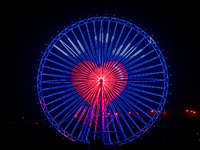 The 120-meter-high ''Chongqing Eye Ferris Wheel'' in Happy Valley opens for operation after an upgrade in Chongqing, China, on December 20,...