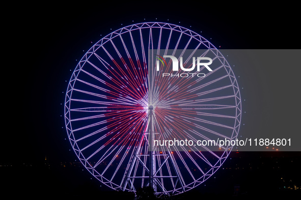 The 120-meter-high ''Chongqing Eye Ferris Wheel'' in Happy Valley opens for operation after an upgrade in Chongqing, China, on December 20,...