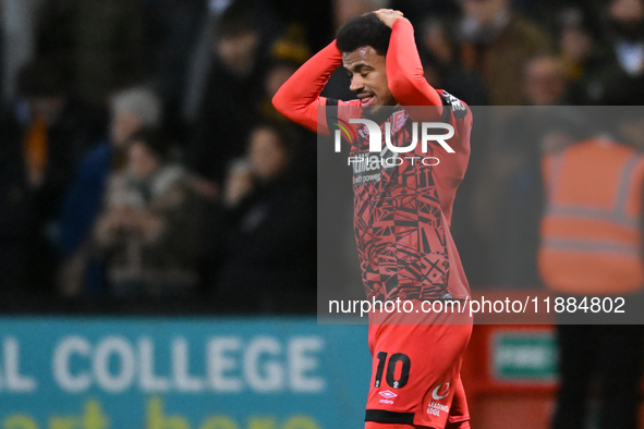 Josh Koroma (10 Huddersfield) holds his head after going close during the Sky Bet League 1 match between Cambridge United and Huddersfield T...